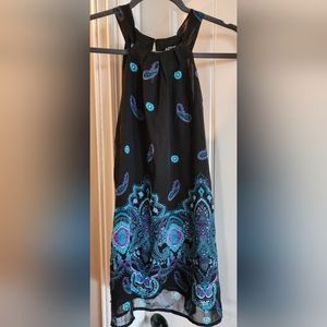 Beautiful summer top with blue crystals.